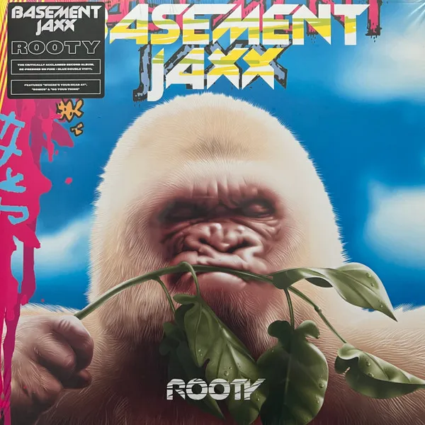 A photorealistic airbrushed close-up of a white albino gorilla with a squinting, scrunched face, holding a green leafy branch against a bright blue sky with clouds, framed by graffiti-style layered lettering in yellow, cyan and magenta.