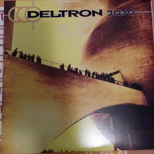 A sepia and olive-toned photographic image of silhouetted figures walking single file up a steep angled ramp or bridge toward a massive curved dome-like structure, with bold text and interlocking circle logo across the top.
