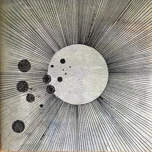 A black-and-white pen-and-ink drawing of a large pale circle radiating dense hand-drawn rays like a sun, with a scattering of small dark dots and speckled spheres trailing off to the lower left across a textured off-white background.