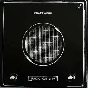 A stark black-and-white, high-contrast illustration of a vintage radio speaker — a large circular mesh grille flanked by two round control knobs and a rectangular label plate, framed by thin white border lines.