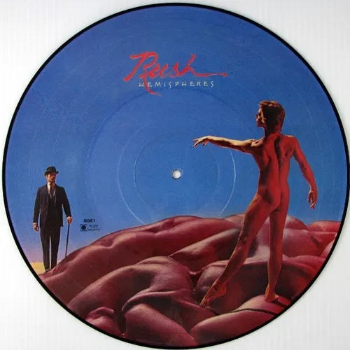 A picture-disc vinyl record showing a surreal painted scene against a blue sky: a nude figure stands with arm outstretched atop a vast red-pink brain-like landscape, while a bowler-hatted man in a dark suit with a cane stands on the horizon at left, with red script lettering at the top.