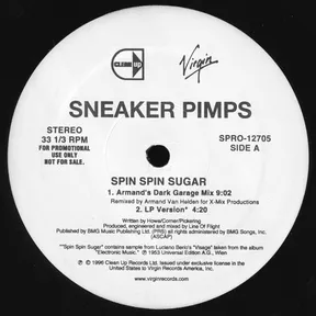 A purely typographic black-and-white vinyl record label, with a white circular center bearing bold grey and black text, two small logos at the top, and a black spindle hole in the middle against a black background.