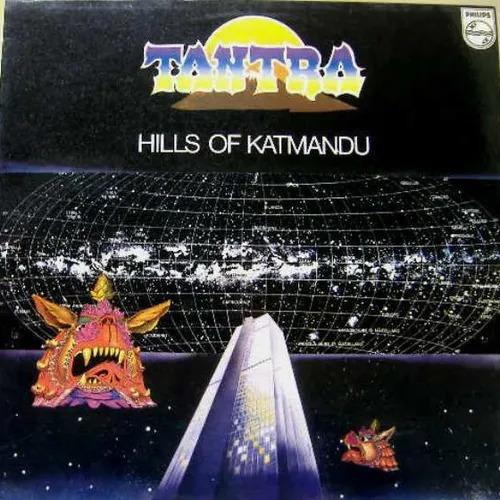 A cosmic starfield with a glowing grid-mapped galaxy sphere and a rising sun arcs above a futuristic silver spire, flanked by ornate, fanged Himalayan-style demon masks in orange, pink and gold, set against a deep black and blue night sky.