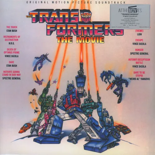A pale-lavender vinyl sleeve featuring 1980s cartoon-style robot warriors firing orange laser blasts upward around a central blue-and-red leader figure, with chrome red-and-blue block lettering and a red robot-face emblem across the top and track listings in red text down both sides.